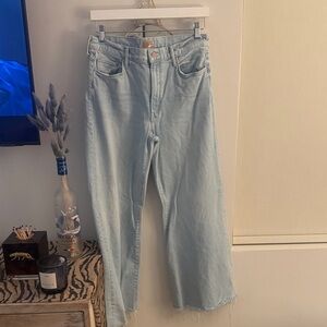 Mother unfinished hem light wash jeans